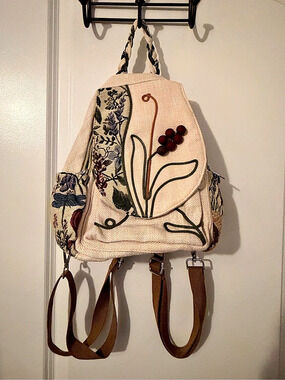Embroidered Floral Backpack Cream with Colorful Flowers and Designs.